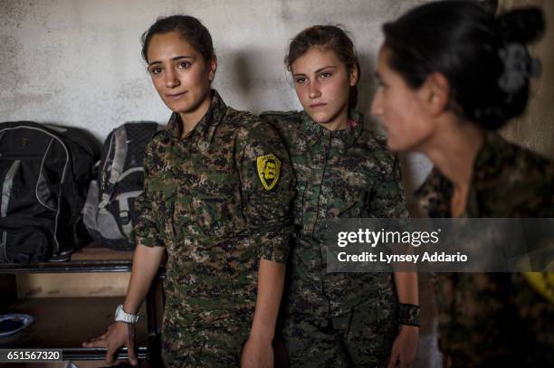 Fighters in training, Variya from Qamishlo, left, and Xwinda right, at a base in the former ISIS and Jabat al Nusra stronghold of Tel Bark, which was...