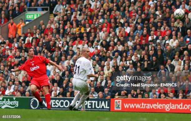 Liverpool's Robbie Fowler sees his chip come back off the bar allowing Danny Murphy to head home their equalising goal past Leeds United goalkeeper...