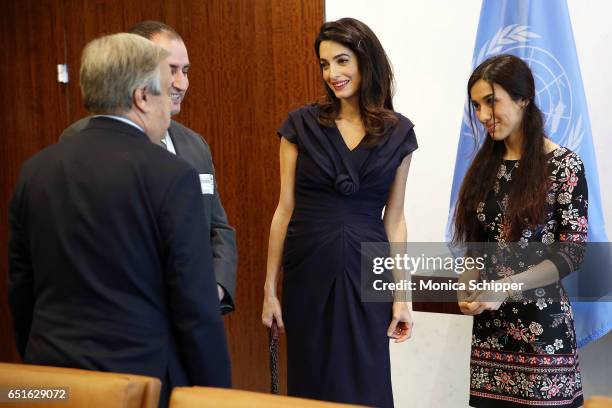 Human rights attorney Amal Clooney and human rights activist Nadia Murad visit the Secretary-General Of The United Nations Antonio Guterres at United...
