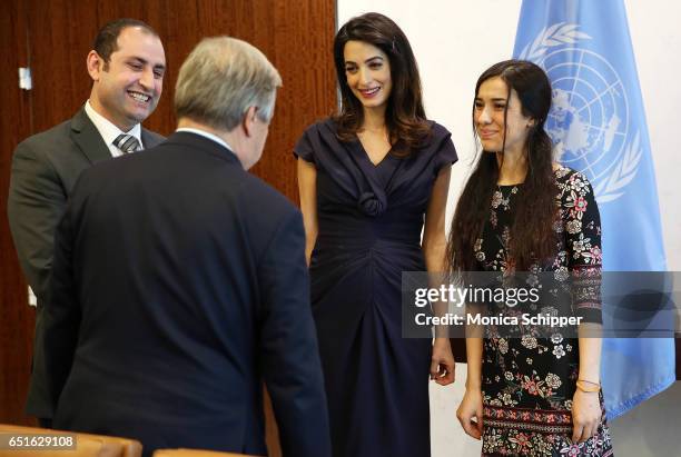 Human rights attorney Amal Clooney and human rights activist Nadia Murad visit the Secretary-General Of The United Nations Antonio Guterres at United...