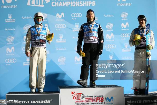 Jonathon Lillis of USA wins the gold medal, Guangpu Qi of China wins the silver medal, David Morris of Australia wins the bronze medal during the FIS...