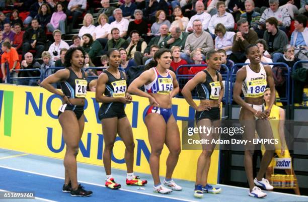 Gail Devers, Chandra Sturrup, Diane Allahgreen, Kelli White and Juliet Campbell await the result of the Women's 60m Final