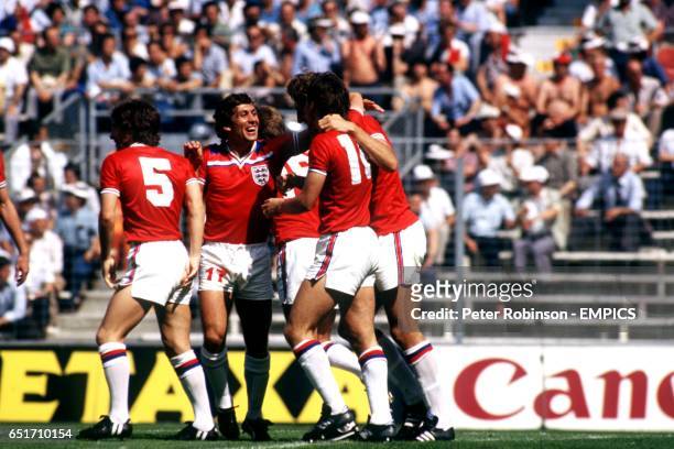 England's Steve Coppell, Kenny Sansom, Bryan Robson and Terry Butcher celebrate Robson's opening goal, scored within thirty seconds of the kick off