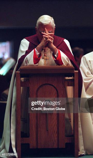 Cardinal Bernard Law says a prayer during the mass for two slain nuns, sister Edna Mary Cardoza and Sr. Julien Fortin, servants of the Blessed...