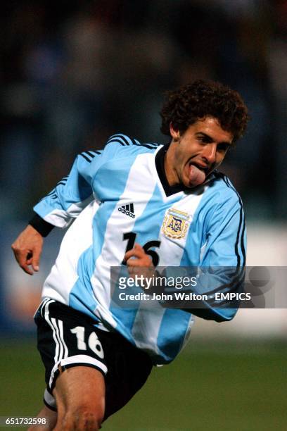 Argentina's Pablo Aimar celebrates scoring