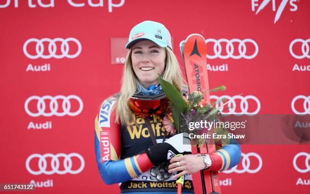 Mikaela Shiffrin of the United States celebrates on the podium after winning the Audi FIS World Cup Ladies' Giant Slalom on March 10, 2017 in Squaw...