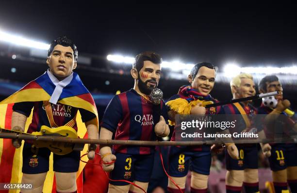 Dolls of Luis Suare,Gerard Piquet, Andres Iniesta, Lionel Messi and Neymar of Barcelona are seen prior to the UEFA Champions League Round of 16...