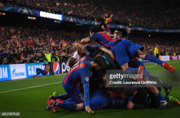 Sergio Roberto of Barcelona is congratulated on scoring the sixth goal during the UEFA Champions League Round of 16 second leg match between FC...