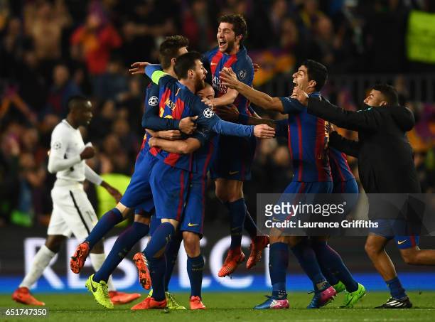 Lionel Messi,Sergio Roberto and Luis Suarez of Barcelona celebrate on the final whistle during the UEFA Champions League Round of 16 second leg match...
