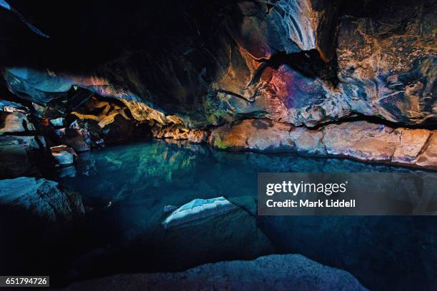 natural hot spring in grjotagja cave, myvatn region, iceland - grjótagjá cave stock pictures, royalty-free photos & images