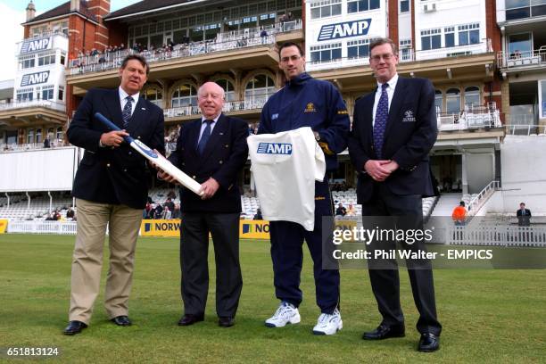 Surrey CCC Chairman Michael Soper presents a bat to AMP Chairman Sir Malcolm Bates watched by Martin Bicknell and Surrey CCC CEO Paul Sheldon