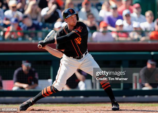 Hunter Pence of the San Francisco Giants bats in the fifth inning against the Cleveland Indians during the spring training game at Scottsdale Stadium...