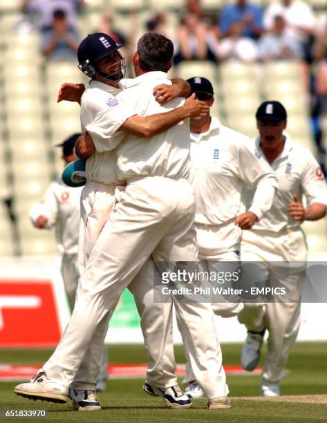 England's Andrew Caddick is hugged my Michael Vaughnn after taking the wicket of Sri Lanka's Hashan Tillakaratne