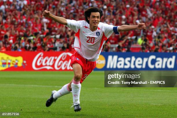 Republic of Korea's captain Myung Bo Hong celebrates scoring the winning penalty