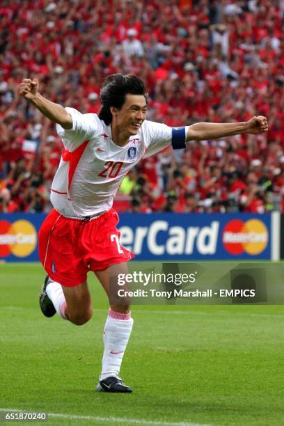 Republic of Korea's Myung Bo Hong celebrates scoring the winning penalty in the penalty shoot out against Spain