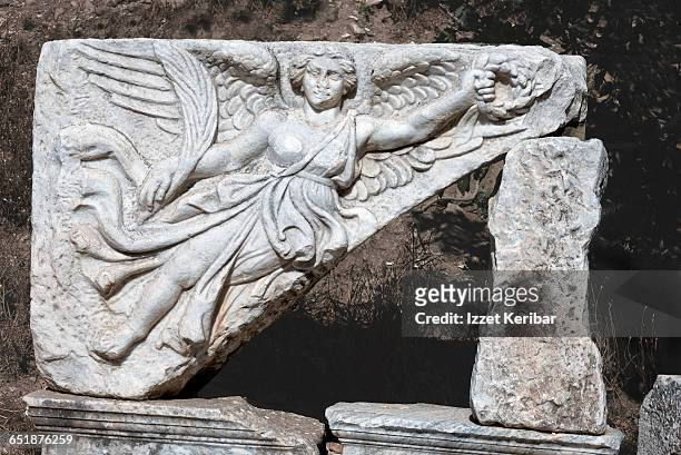 sculpture depicting winged nike, ephesus, izmir - ephesus stock pictures, royalty-free photos & images