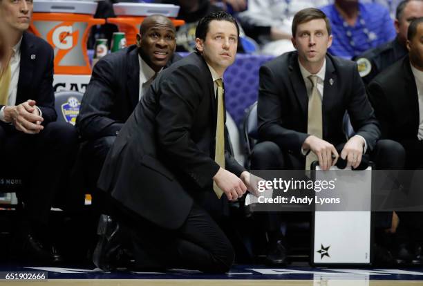 Bryce Drew the head coach of the Vanderbilt Commodores gives instructions to his team against the Florida Gators during the quarterfinals of the SEC...