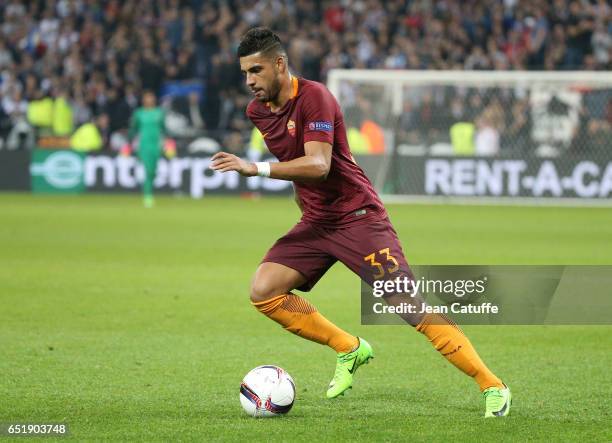 Emerson Palmieri of AS Roma in action during the UEFA Europa League Round of 16 first leg match between Olympique Lyonnais and AS Roma at Parc OL on...