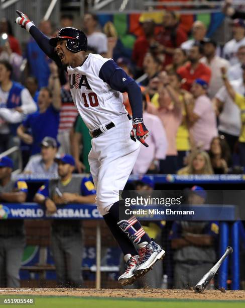 Adam Jones of the United States celebrates a walk off RBI single in the 10th inning during a Pool C game of the 2017 World Baseball Classic against...