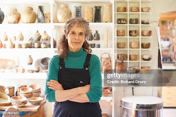 potter in her workshop - clay earring stock pictures, royalty-free photos & images