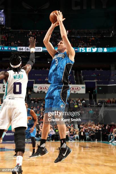 Damjan Rudez of the Orlando Magic shoots the ball during the game against the Charlotte Hornets on March 10, 2017 at Time Warner Cable Arena in...