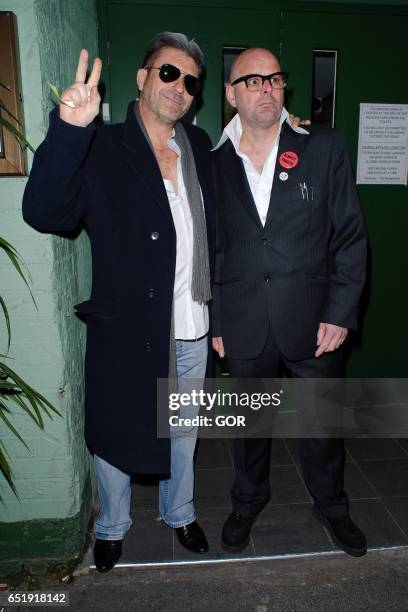 Simon Cowell and Harry Hill lookalikes arriving at FuManchu club in South London for private gig on March 10, 2017 in London, England.