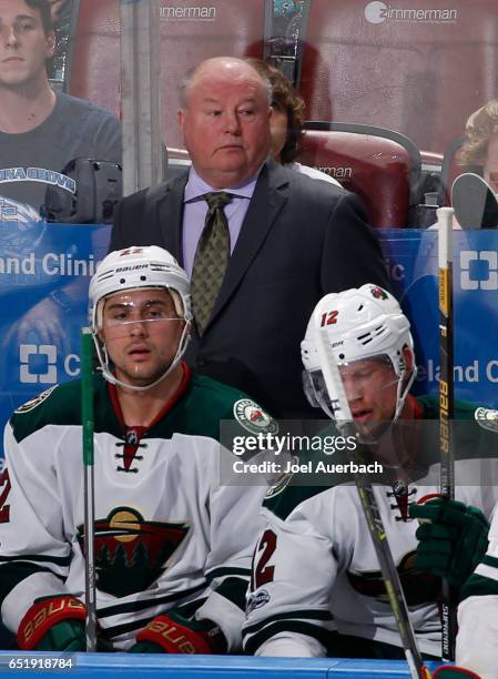 Head coach Bruce Boudreau of the Minnesota Wild looks on during a break in action against the Florida Panthers at the BB&T Center on March 10, 2017...