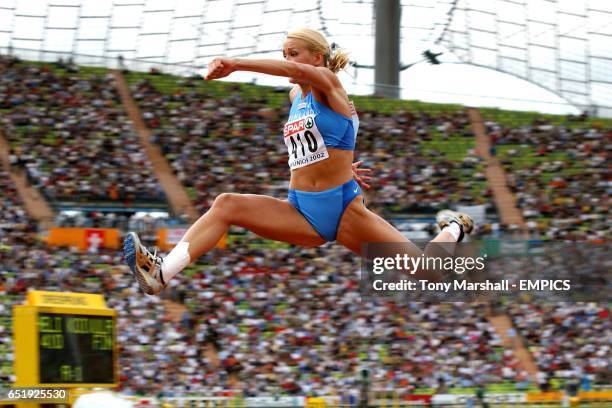 Finland's Heli Koivula on her way to the silver medal in the Women's Triple Jump