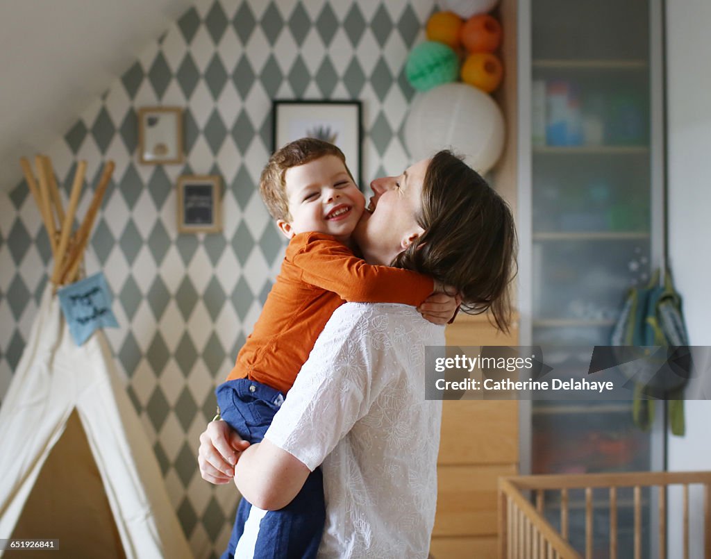 A mom with her son in her arms