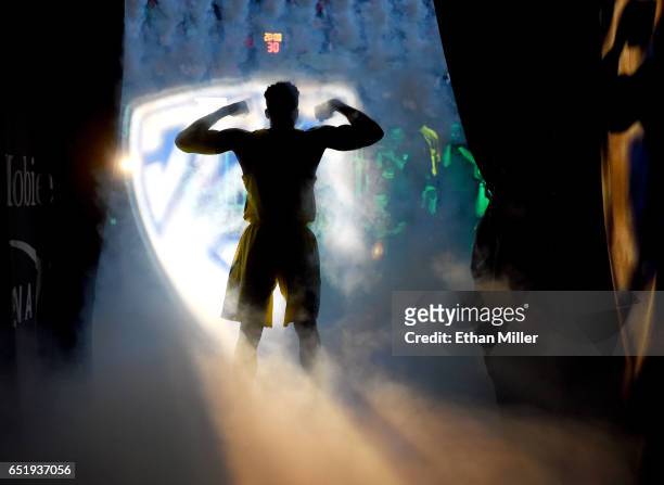 Dylan Ennis of the Oregon Ducks is introduced before a semifinal game of the Pac-12 Basketball Tournament against the California Golden Bears at...
