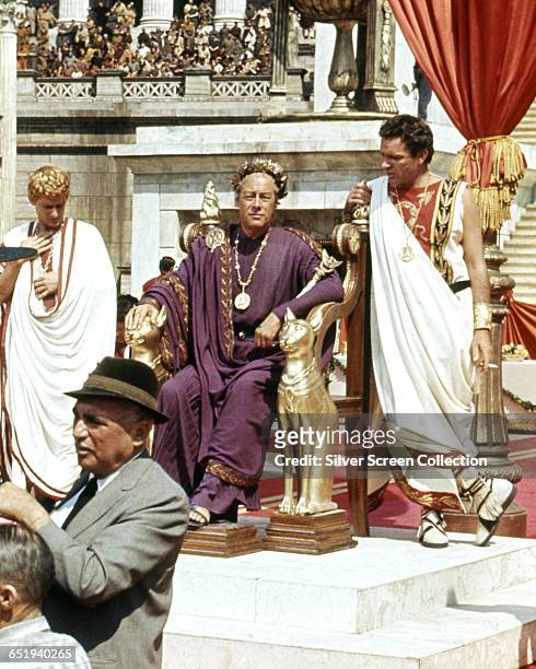 From left to right, Roddy McDowall as Octavian , Rex Harrison as Julius Caesar and Richard Burton as Mark Antony on the set of the film 'Cleopatra',...