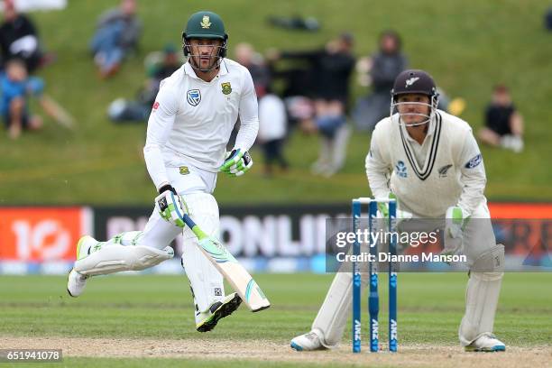 Watling of New Zealand attempts to run out Faf du Plessis of South Africa during day four of the First Test match between New Zealand and South...