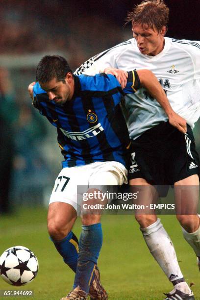 Inter Milan's Francesco Coco holds off the challenge of Rosenborg's Frode Johnsen