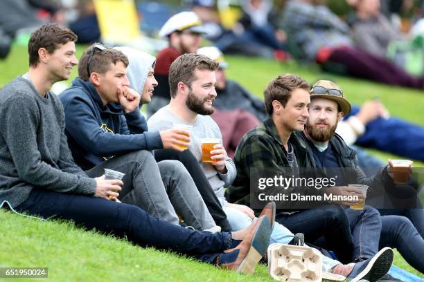 Supporters look on during day four of the First Test match between New Zealand and South Africa at University Oval on March 11, 2017 in Dunedin, New...