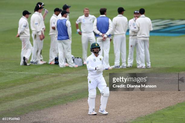Neil Wagner of New Zealand and team mates celebrate the dismissal of JP Duminy of South Africa during day four of the First Test match between New...