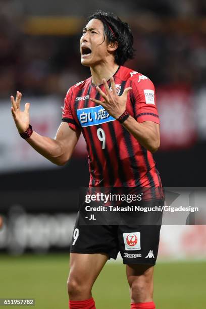 Ken Tokura of Consadole Sapporo celebrates scoring his side's first goal during the J.League J1 match between Consadole Sapporo and Cerezo Osaka at...