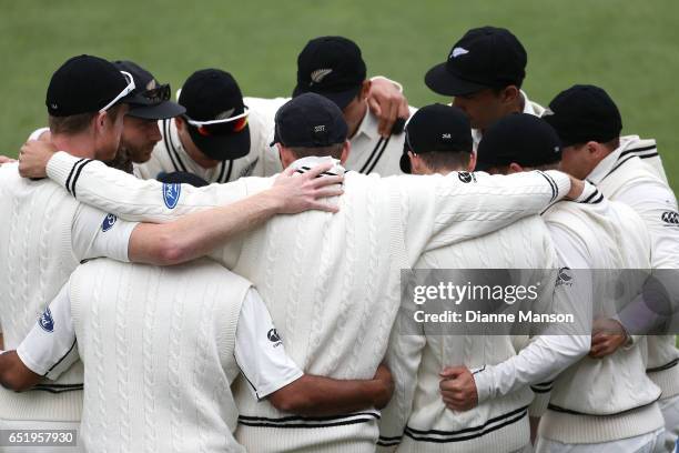 New Zealand team huddle during day four of the First Test match between New Zealand and South Africa at University Oval on March 11, 2017 in Dunedin,...