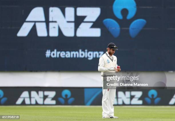 Kane Williamson of New Zealand looks on during day four of the First Test match between New Zealand and South Africa at University Oval on March 11,...
