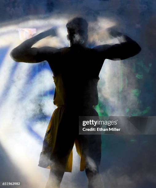 Dylan Ennis of the Oregon Ducks is introduced before a semifinal game of the Pac-12 Basketball Tournament against the California Golden Bears at...