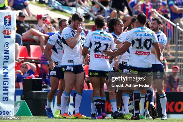 Titans players look on during the round two NRL match between the Newcastle Knights and the Gold Coast Titans at McDonald Jones Stadium on March 11,...