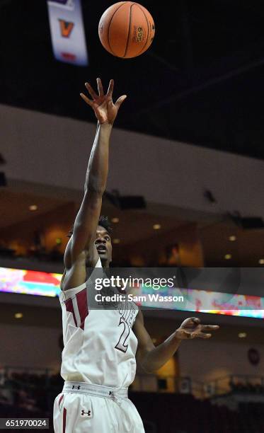 Braxton Huggins of the New Mexico State Aggies shoots against the UKMC Kangaroos during a semifinal game of the Western Athletic Conference...