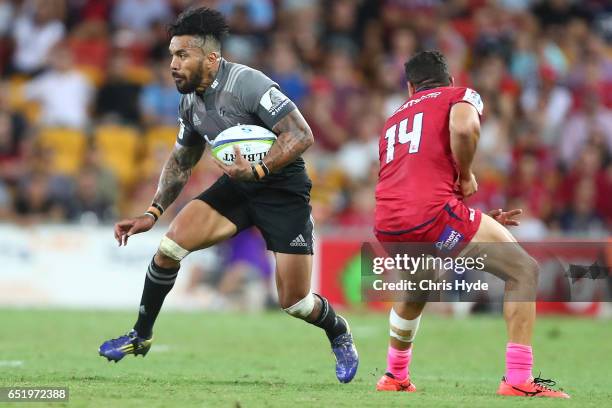 Digby Ioane of Crusaders runs the ball during the round three Super Rugby match between the Reds and the Crusaders at Suncorp Stadium on March 11,...