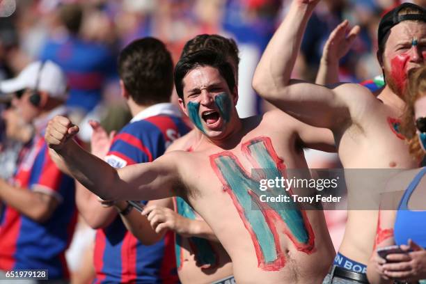 Knights fans celebrate during the round two NRL match between the Newcastle Knights and the Gold Coast Titans at McDonald Jones Stadium on March 11,...