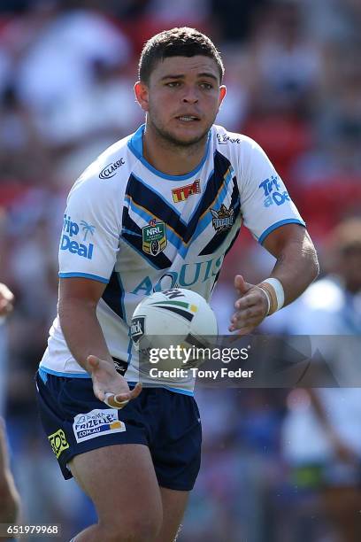 Ashley Taylor of the Titans runs the ball during the round two NRL match between the Newcastle Knights and the Gold Coast Titans at McDonald Jones...