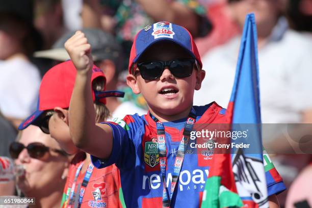 Knights fan celebrates during the round two NRL match between the Newcastle Knights and the Gold Coast Titans at McDonald Jones Stadium on March 11,...