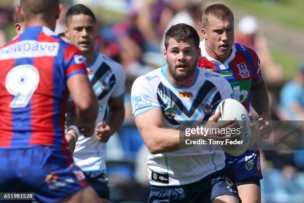 Anthony Don of the Titans makes a break during the round two NRL match between the Newcastle Knights and the Gold Coast Titans at McDonald Jones...