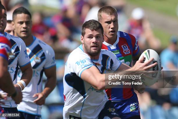 Anthony Don of the Titans makes a break during the round two NRL match between the Newcastle Knights and the Gold Coast Titans at McDonald Jones...