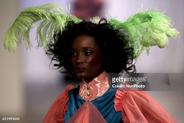 Model presents a creation from the Portuguese fashion designer David Ferreira Fall/Winter 2017/2018 collection during the Lisbon Fashion Week on...