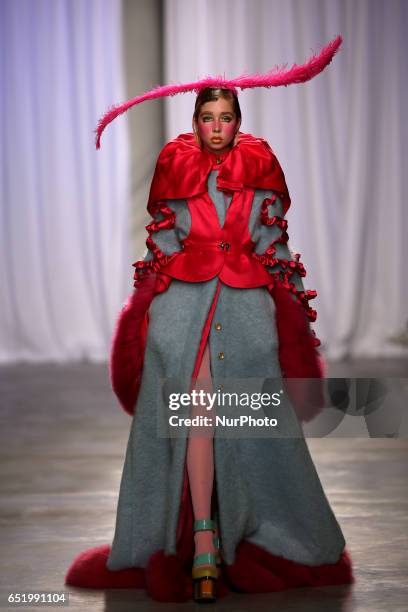 Model presents a creation from the Portuguese fashion designer David Ferreira Fall/Winter 2017/2018 collection during the Lisbon Fashion Week on...