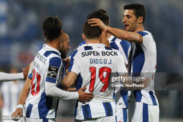 Porto's Portuguese midfielder Diogo Jota celebrates after scoring a goal with Porto's team during Premier League 2016/17 match between FC Arouca and...